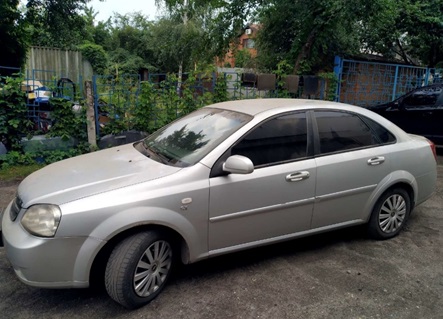 Автомобіль  CHEVROLET LACETTI NF 19B, легковий седан-В, сірий, державний номер AX5466BK, 2008 року випуску, номер кузова KL1NF19BE8K934841, об’єм двигуна 1796. Основні засоби в кількості 15 од.